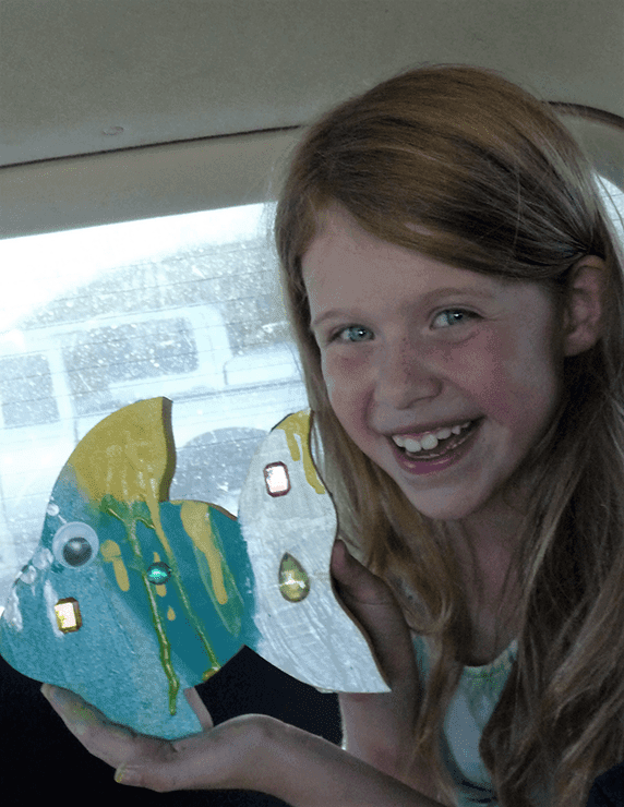 Eliza and fish craft painted at Lulu's Crafty Corner.