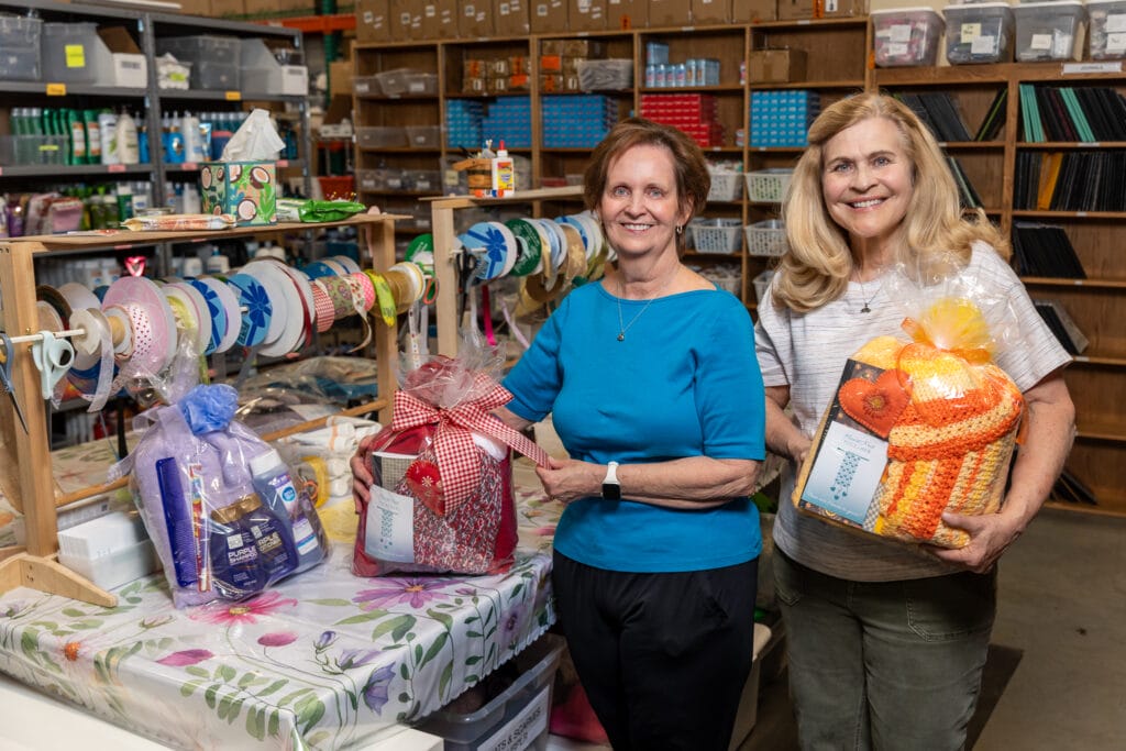 Volunteers at Hearts Knit Together: Mary Jo Dabling and Carolyn Walker.